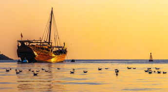 Boutre au coucher du soleil